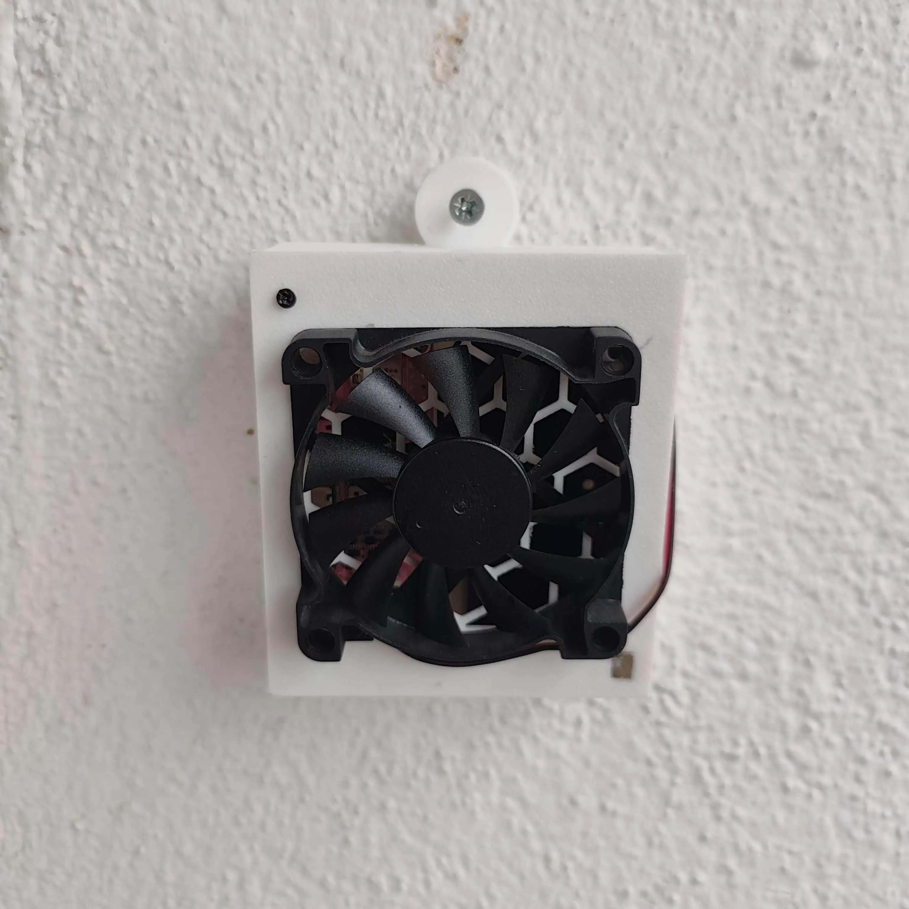 Mini server mounted on an exterior wall